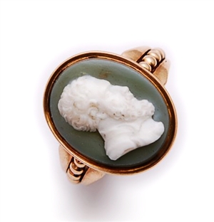 A Victorian green hardstone cameo set ring, the