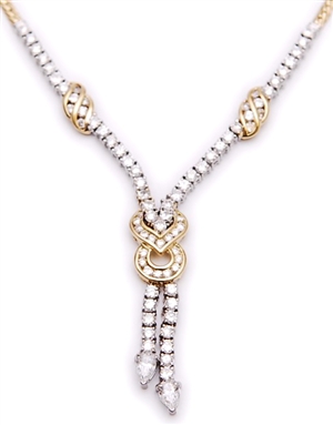 A diamond necklet with central diamond set knot