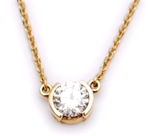 An 18ct gold collet set single stone diamond