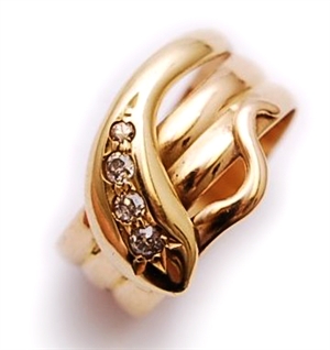 An early 20th century 18ct gold diamond set snake