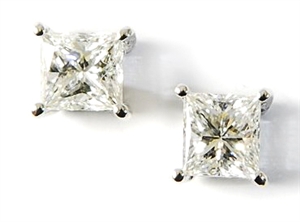 A pair of single stone princess cut diamond stud
