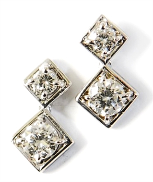 A pair of diamond set stud earring, each