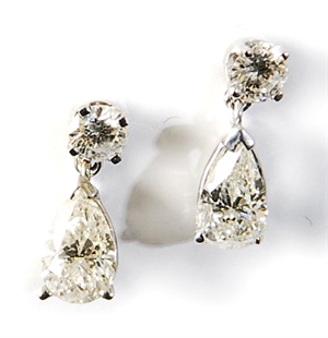 A pair of diamond set dropper earrings,