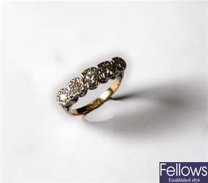 An 18ct gold five stone diamond ring in an