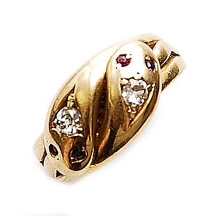 An Edwardian 18ct gold diamond set snake ring, in