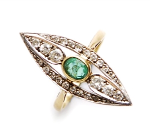 An emerald and diamond set up finger ring,