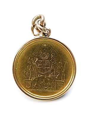 A Victorian commemorative token pendant, 