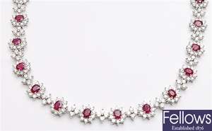 A ruby and diamond set necklet, comprising twenty