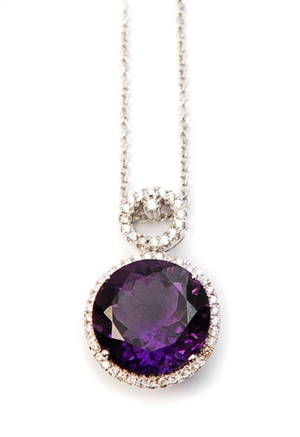 An amethyst and diamond cluster pendant,