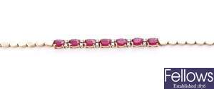 A ruby and diamond set bracelet, comprising seven