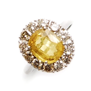 An 18ct white gold sapphire and diamond set