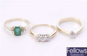 Three rings, to include an 18ct gold emerald and