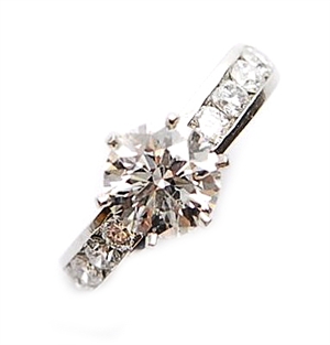 TIFFANY & CO. - A platinum diamond set ring,