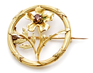 A French stone set floral brooch, comprising a