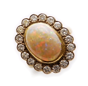 An 18ct gold opal ad diamond cluster ring,