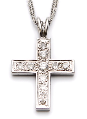 A diamond set cross pendant, set with eleven pave