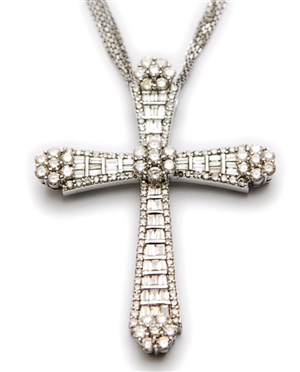 An 18ct white gold diamond set cross pendant,