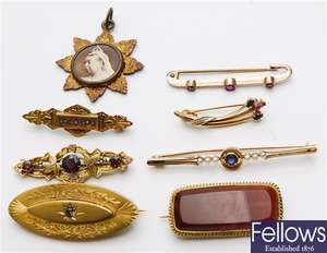 Eight items to include a marquise shaped brooch,