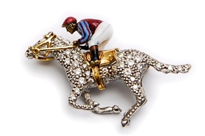 An 18ct white gold diamond set horse and jockey