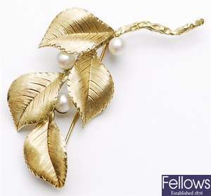 A foliate design brooch comprising four leaves