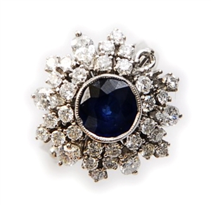 A sapphire and diamond cluster ring, comprising a