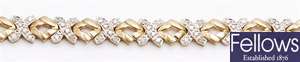 A 9ct gold diamond set cross link design bangle,
