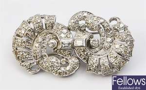 A diamond set double clip brooch, comprising two