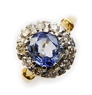 An 18ct gold sapphire and diamond set cluster