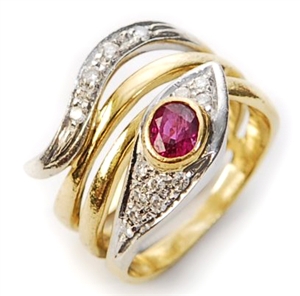 A ruby and diamond set snake design ring, in a
