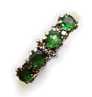 A green garnet and diamond ring, comprising four