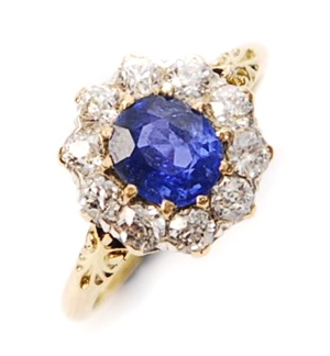 A sapphire and diamond set cluster ring,