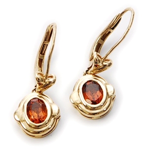 A pair of citrine set dropper earrings, with a