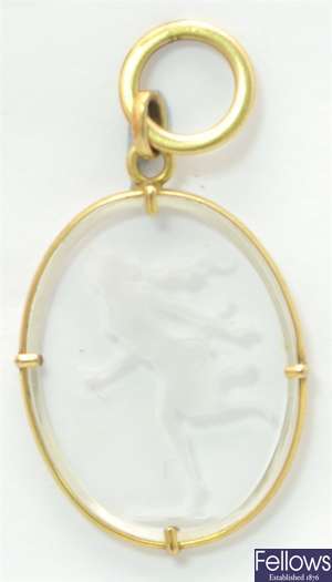 An oval glass intaglio pendant, depicting a