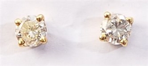 A pair of single stone diamond set stud earrings,