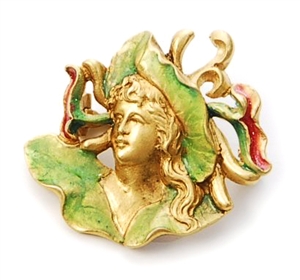 An Art Nouveau style enamelled brooch depicting a