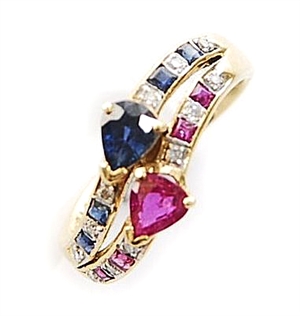 A ruby, sapphire and diamond set curved design