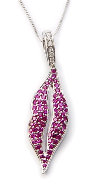 Studio 19 - A ruby and diamond set pendant in the