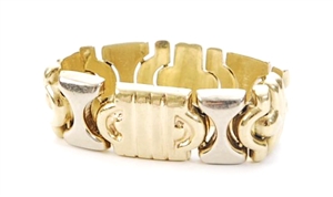 An 18ct gold bi-colour hinged band ring in a