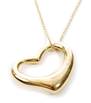 Tiffany & Co - An 18ct gold floating heart