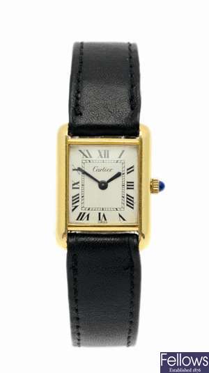 CARTIER - A gold-plated manual wind Tank