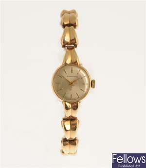 GARRARD - a 9ct gold manual wind lady's wrist