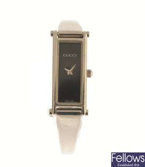 GUCCI - a stainless steel quartz lady's bangle