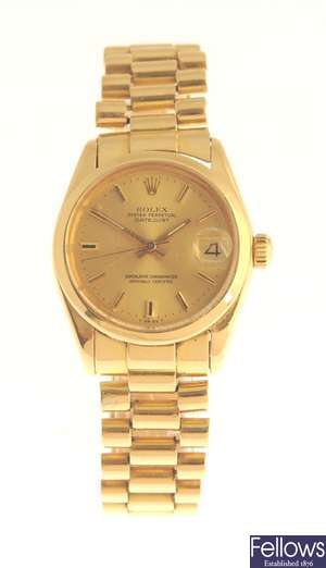 ROLEX - an 18k gold automatic mid size Oyster