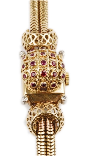 A 9ct gold lady's cased watch, the domed ruby set
