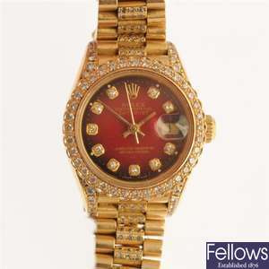 ROLEX - an 18k gold automatic lady's Oyster