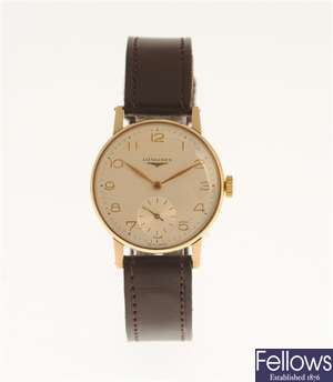 LONGINES - a gentleman's 9ct gold manual wind