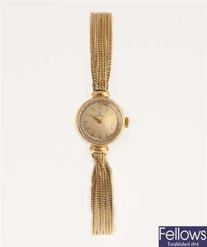 OMEGA - a 9ct gold manual wind lady's bracelet