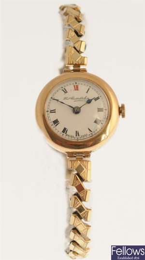 A 9ct gold manual wind lady's watch head, the