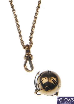 A silver gilt Masonic ball pendant with 9ct gold