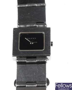 GUCCI - a lady's stainless steel square watch